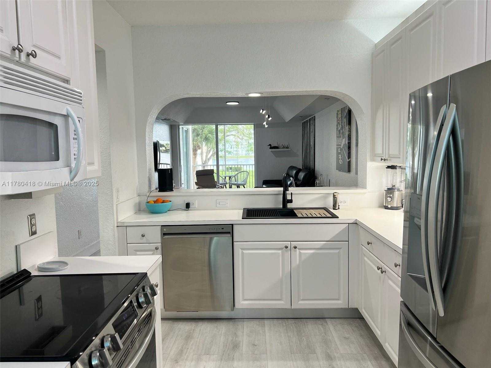 Small Image of 10770 NORTH WEST 66TH ST #203, Doral Number 12