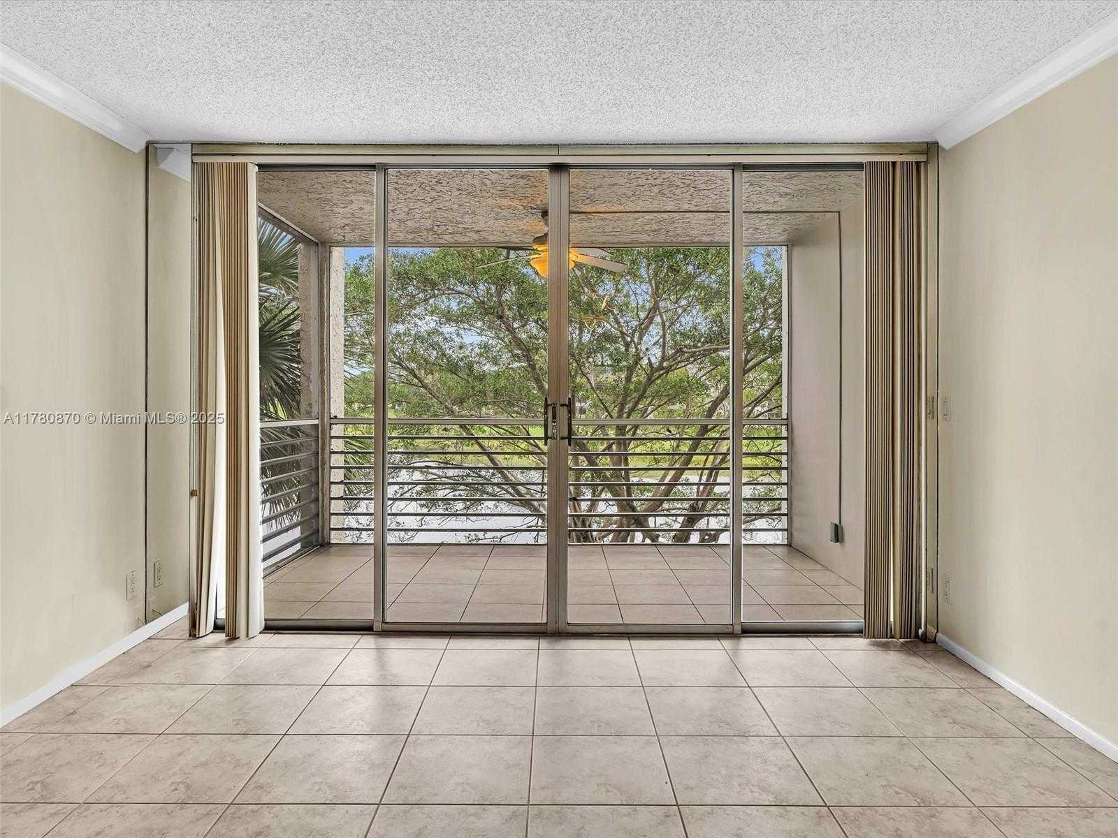 Small Image of 9311 ORANGE GROVE DR #301, Davie Number 3