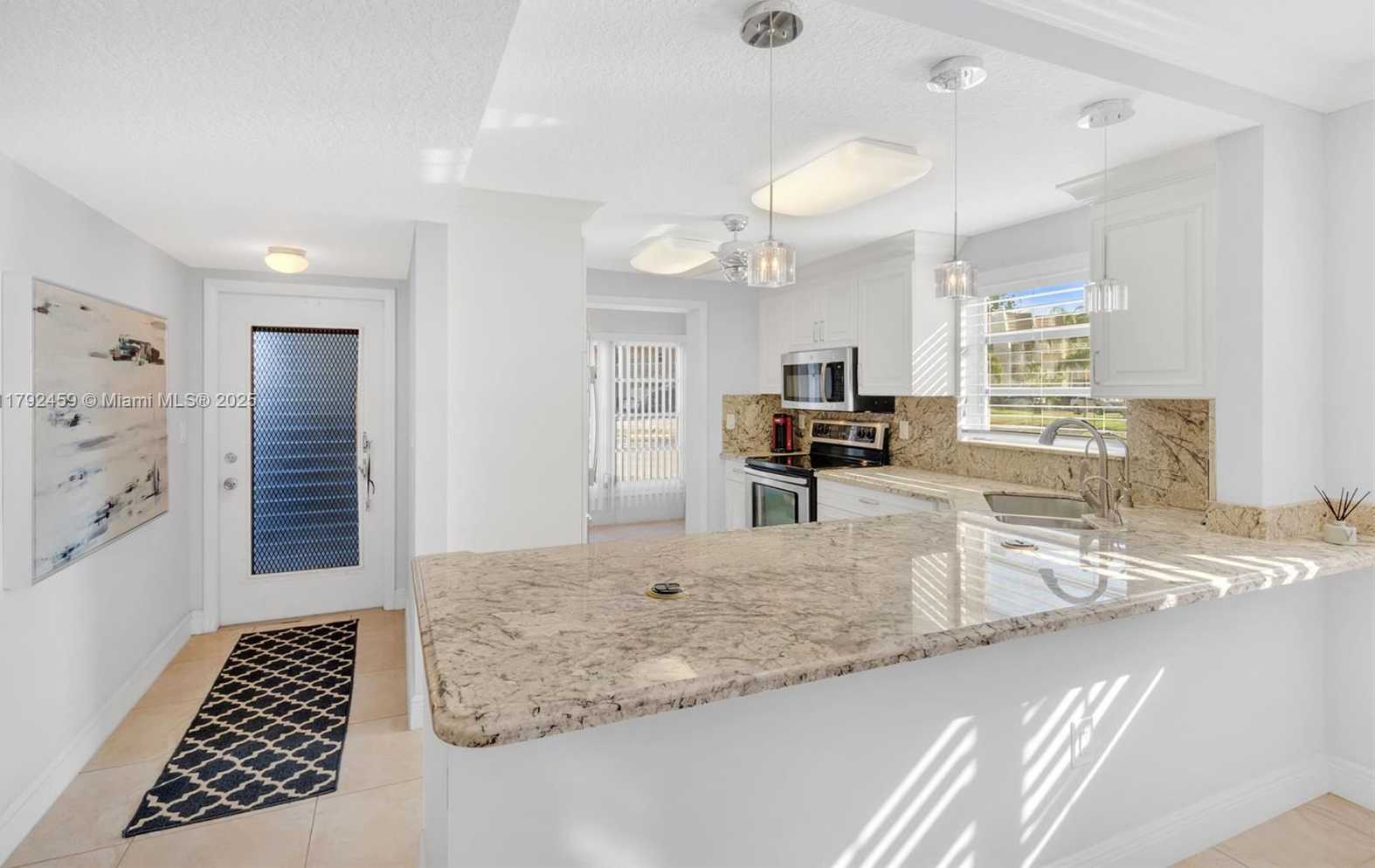 Small Image of 6800 ROYAL PALM BLVD #101F, Margate Number 2