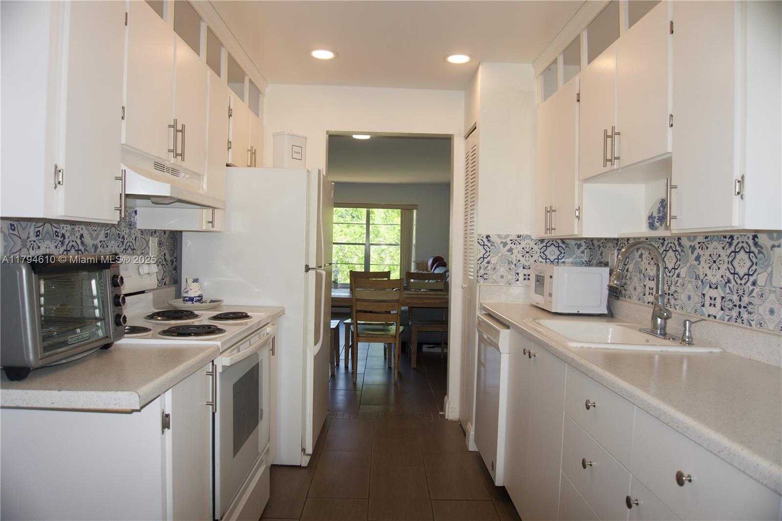 Small Image of 8105 NORTH WEST 61ST ST #A306, Tamarac Number 8
