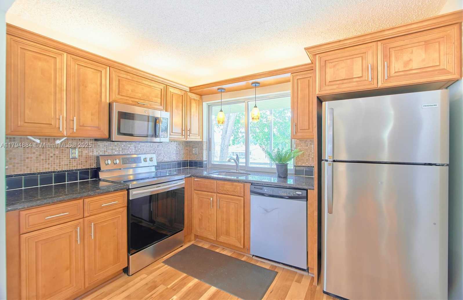 Small Image of 9150 LIME BAY BLVD #201, Tamarac Number 9