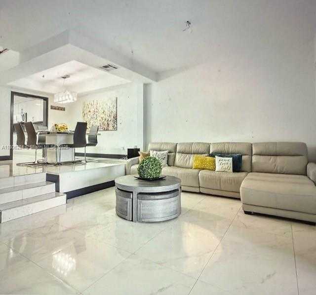 Small Image of 8992 Palm Tree Ln, Pembroke Pines, FL 33024, USA Number 2