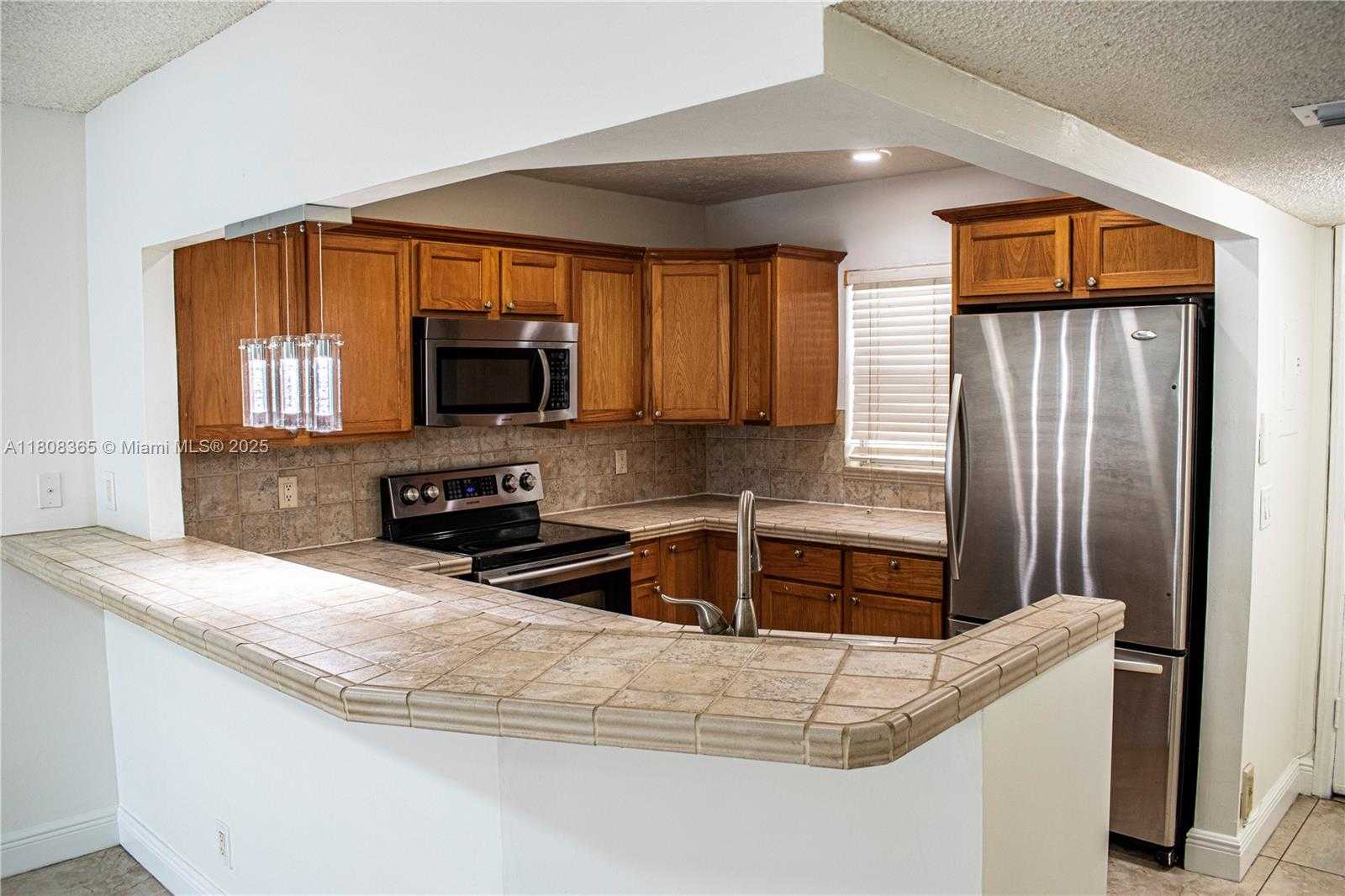 Small Image of 3090 HOLIDAY SPRINGS BLVD #305, Margate Number 8