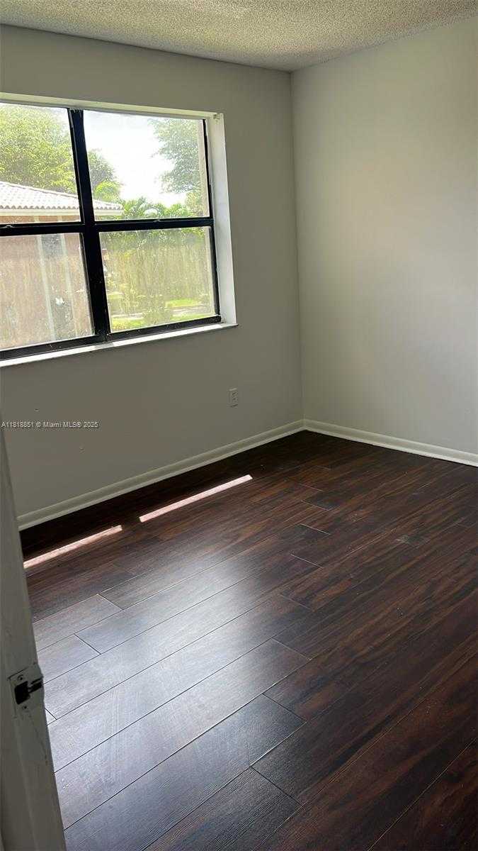 Small Image of 9808 HAMMOCKS BLVD #203-23, Miami Number 17