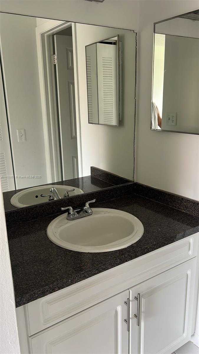 Small Image of 9808 HAMMOCKS BLVD #203-23, Miami Number 23