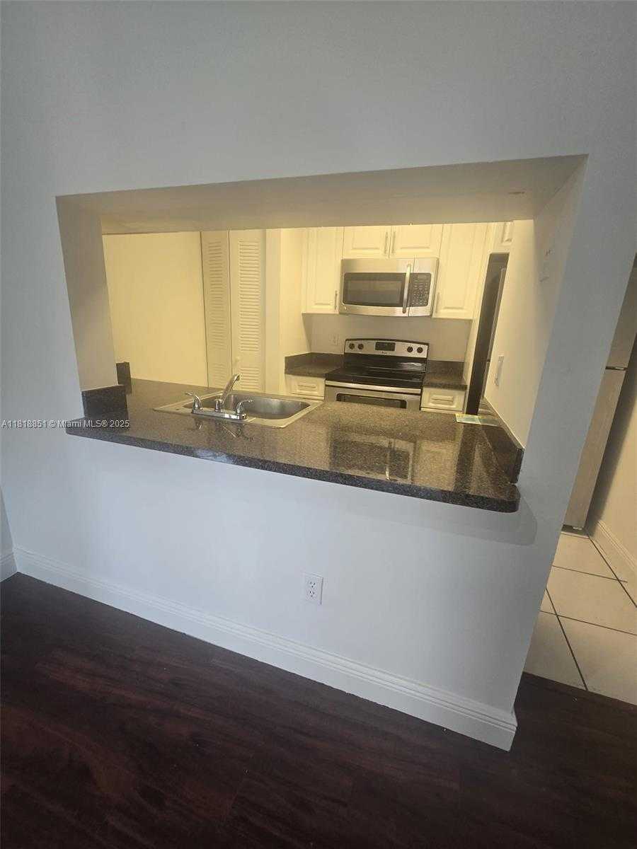 Small Image of 9808 HAMMOCKS BLVD #203-23, Miami Number 4