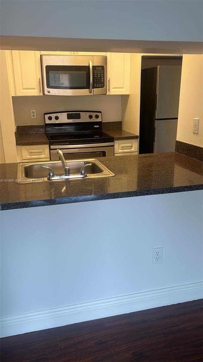 Small Image of 9808 HAMMOCKS BLVD #203-23, Miami Number 5