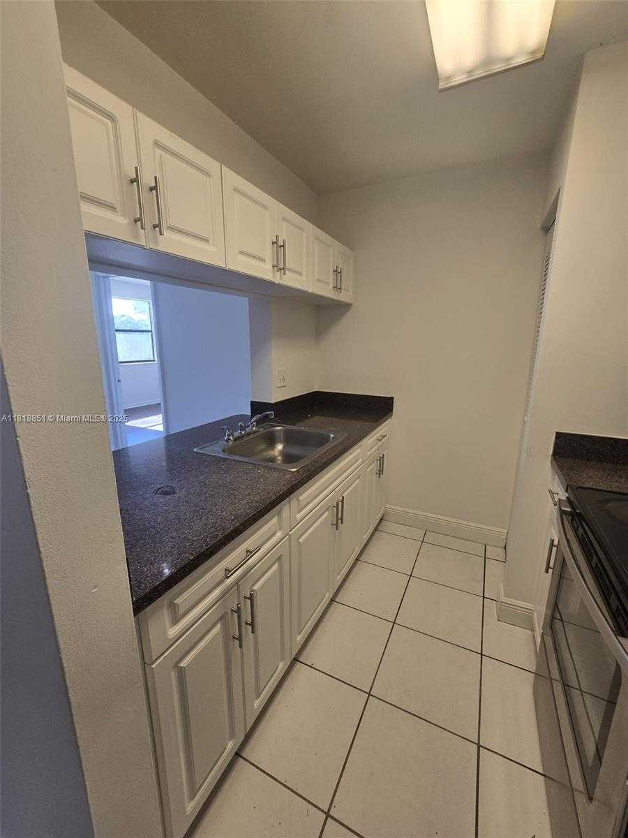 Small Image of 9808 HAMMOCKS BLVD #203-23, Miami Number 9