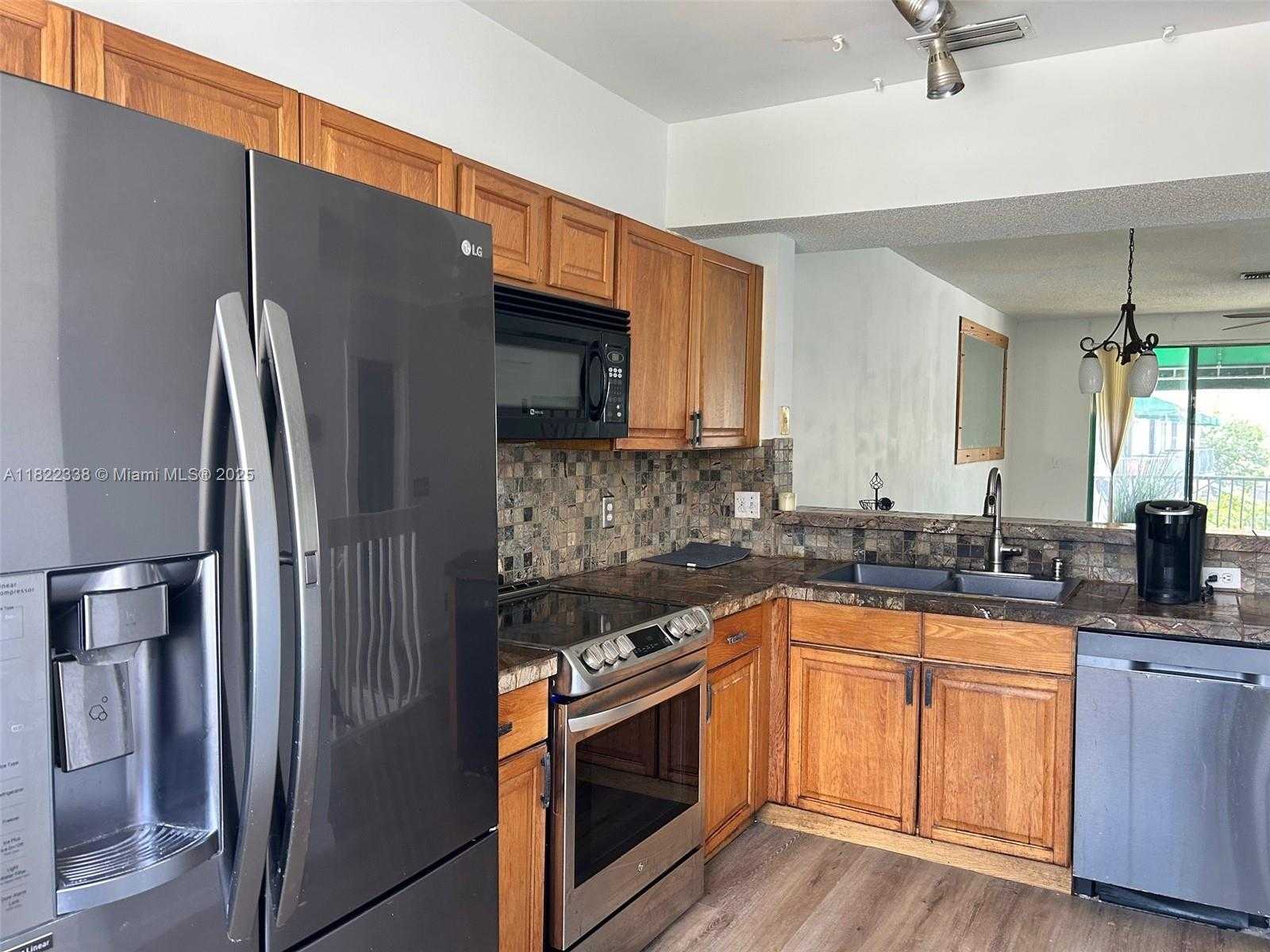Small Image of 12666 NORTH WEST 14TH PL #12666, Sunrise Number 5
