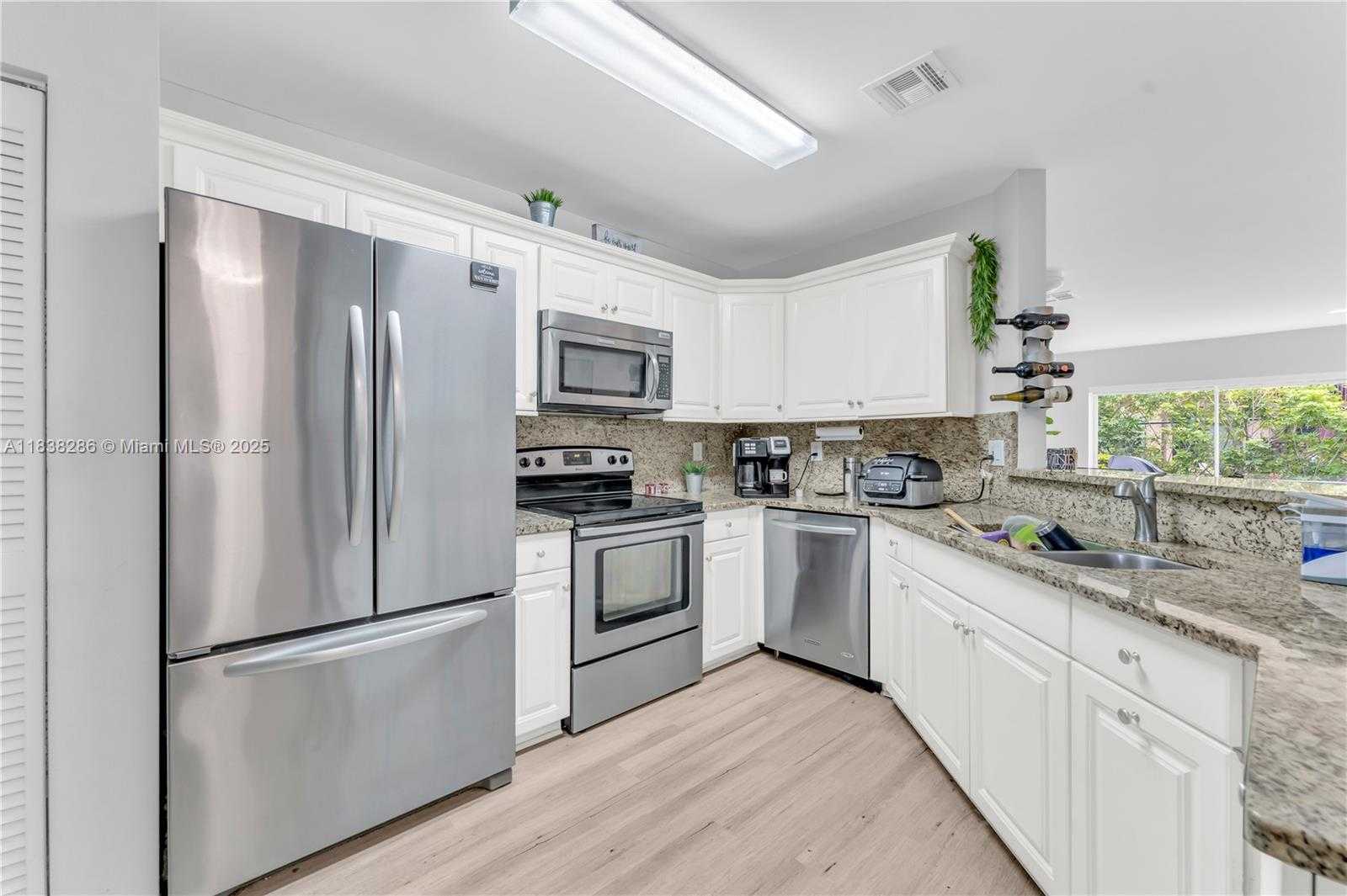 Small Image of 10104 ROYAL PALM BLVD #107-C, Coral Springs Number 6