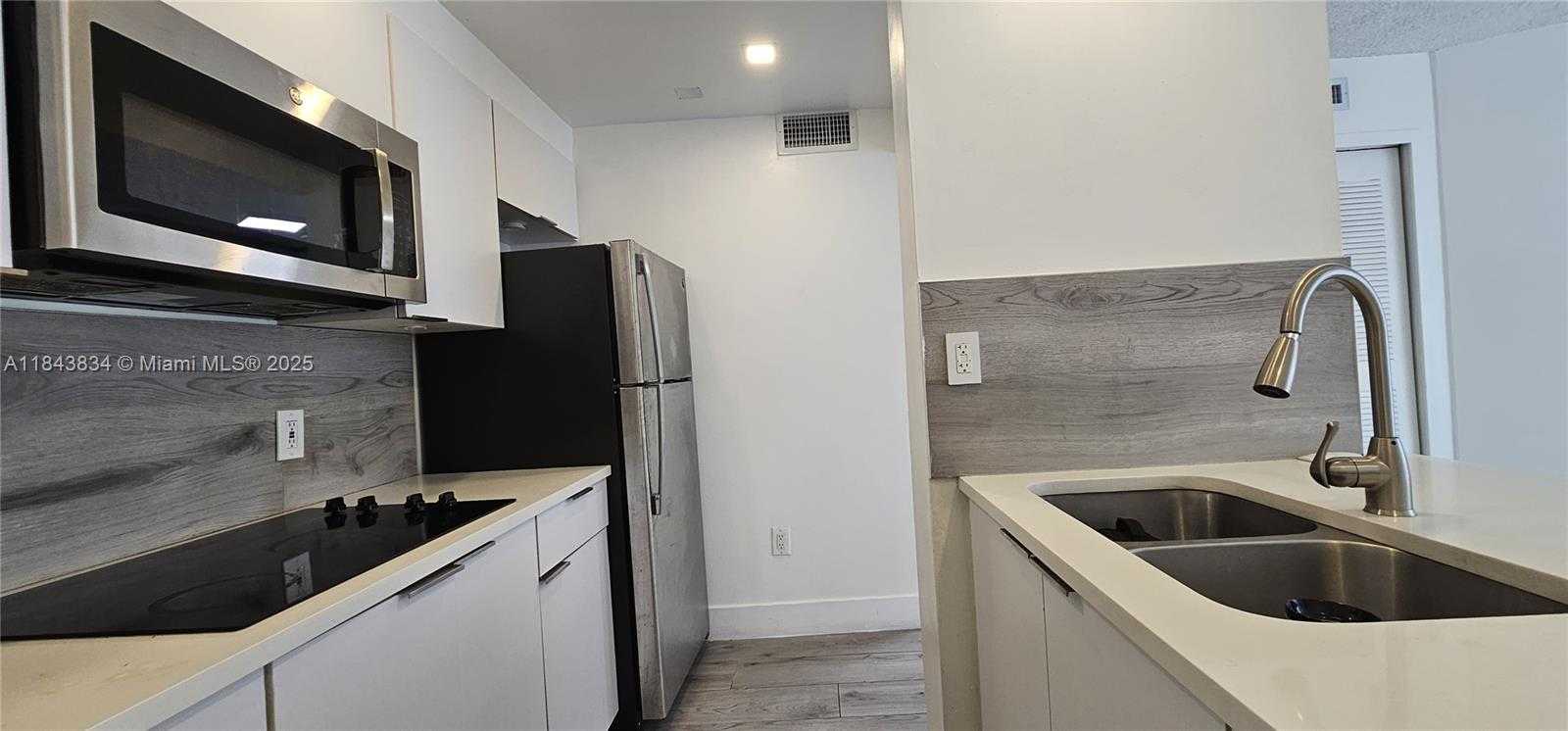 Small Image of 7075 NORTH WEST 186TH ST #C101, Hialeah Number 7
