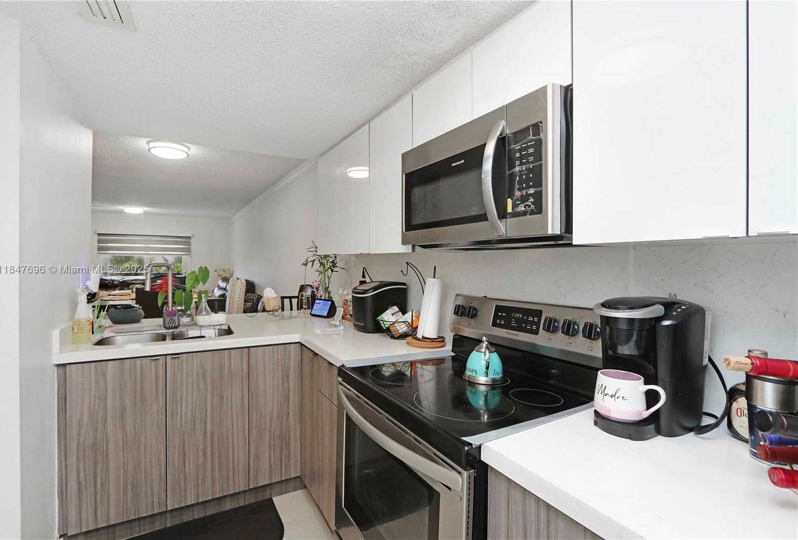 Small Image of 9917 WEST OKEECHOBEE RD #3-303, Hialeah Gardens Number 2