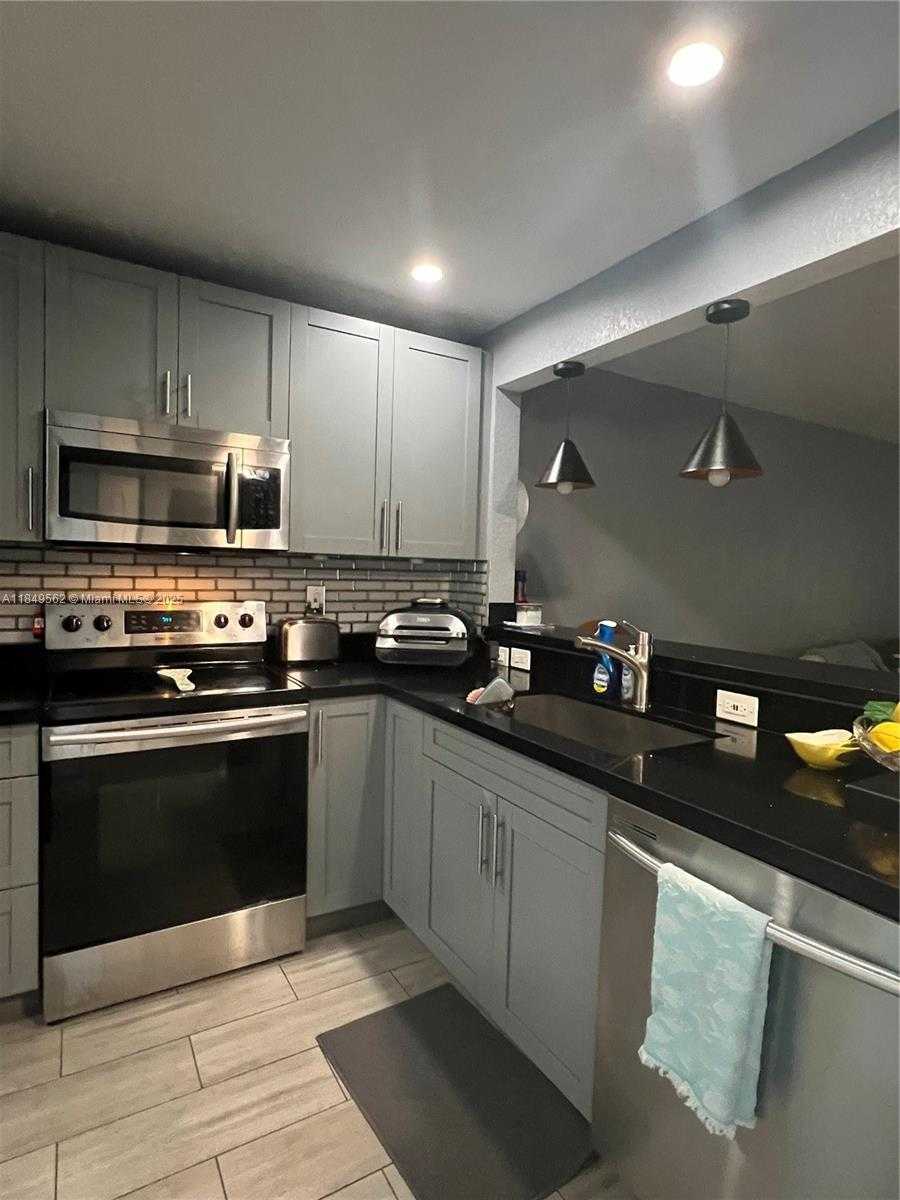 Small Image of 5830 NORTH WEST 64TH AVE #103, Tamarac Number 2