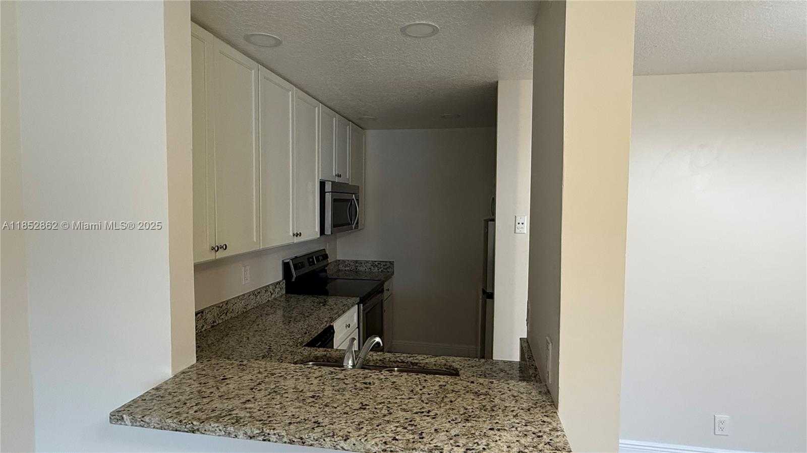 Small Image of 1006 TWIN LAKES DR #20-E, Coral Springs Number 10