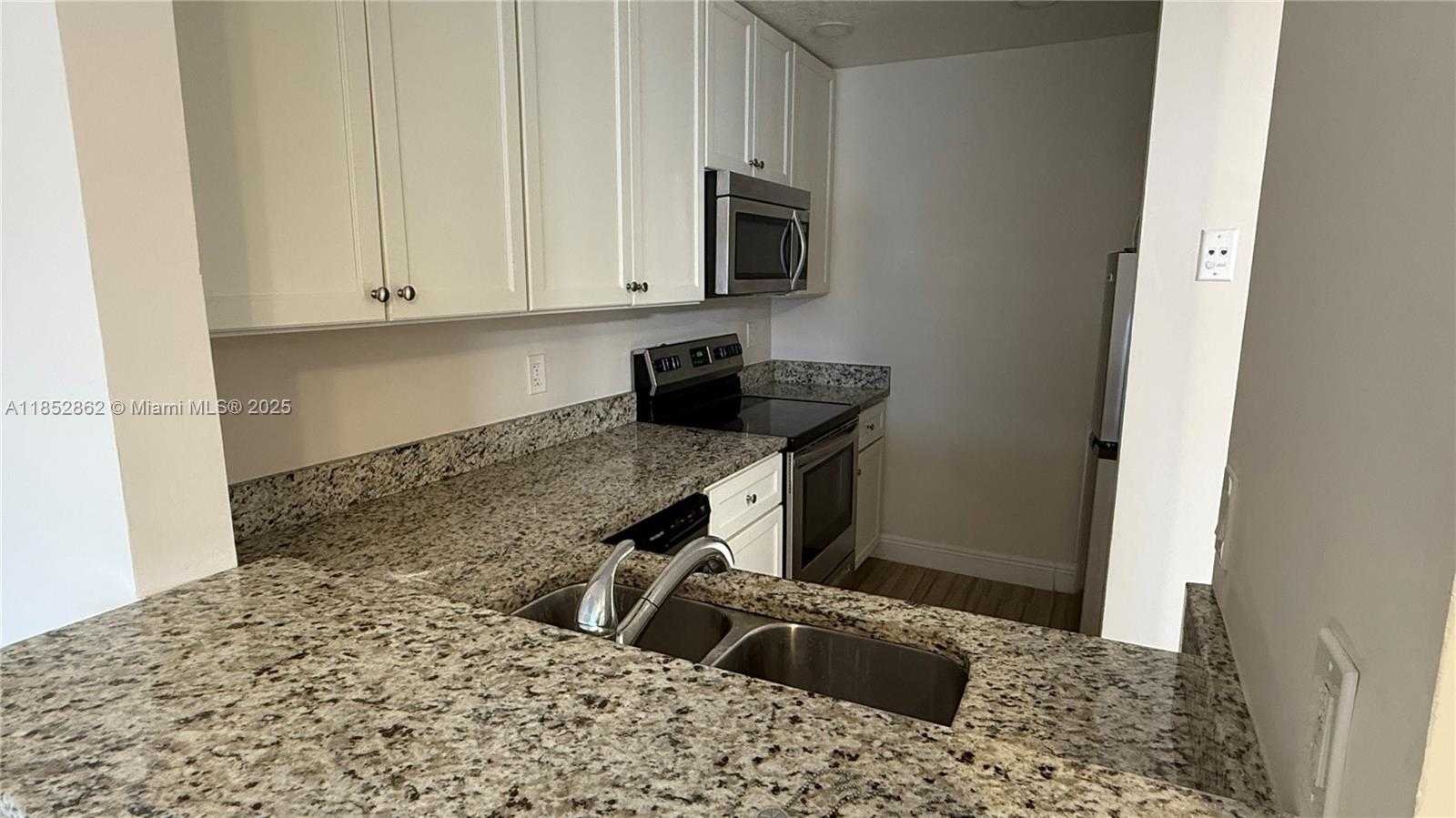 Small Image of 1006 TWIN LAKES DR #20-E, Coral Springs Number 11