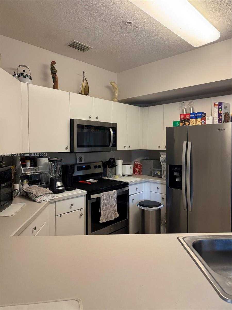 Small Image of 5650 NORTH WEST 115TH CT #104, Doral Number 2