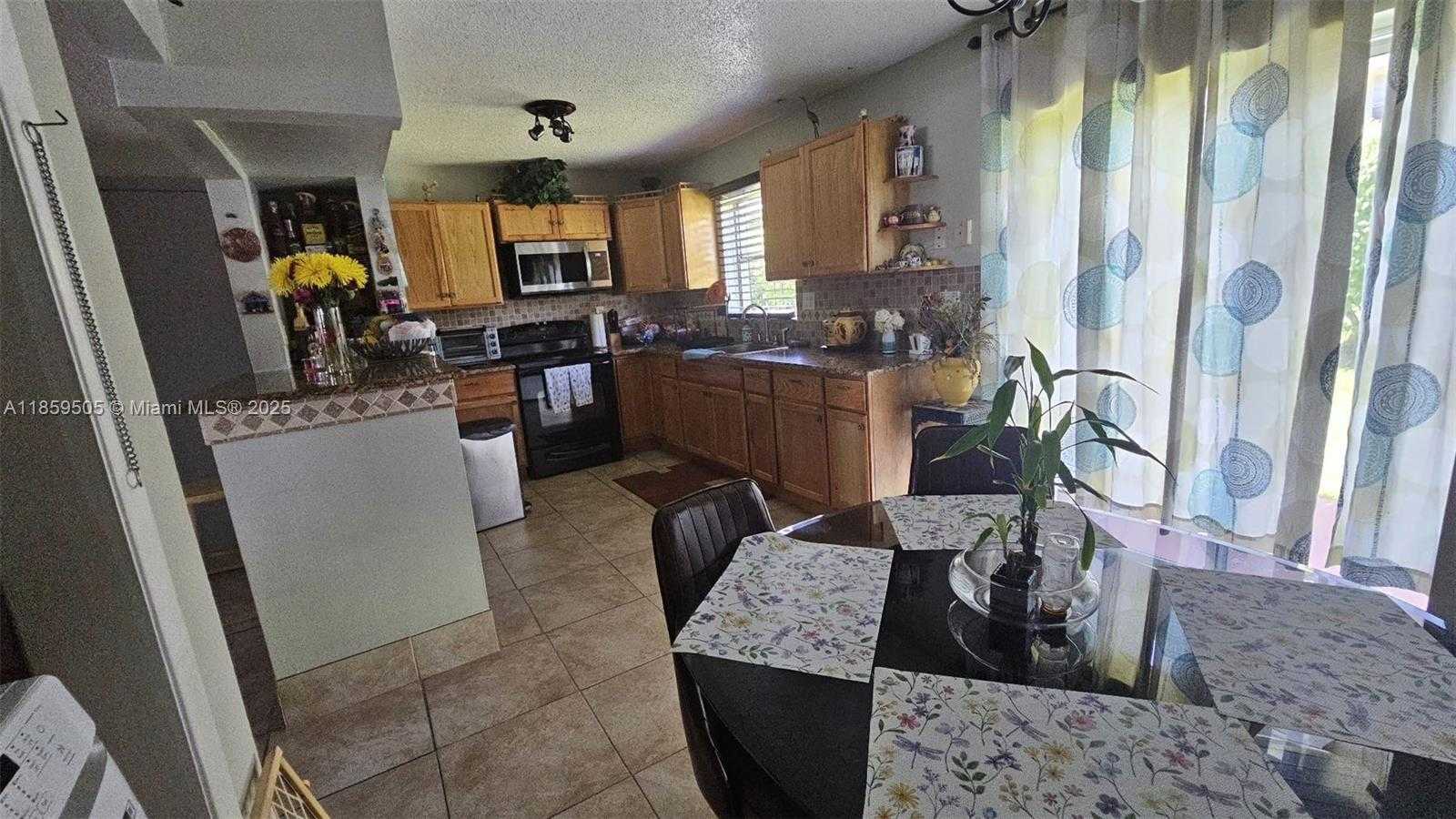Small Image of 7501 KIMBERLY BLVD #104, North Lauderdale Number 2