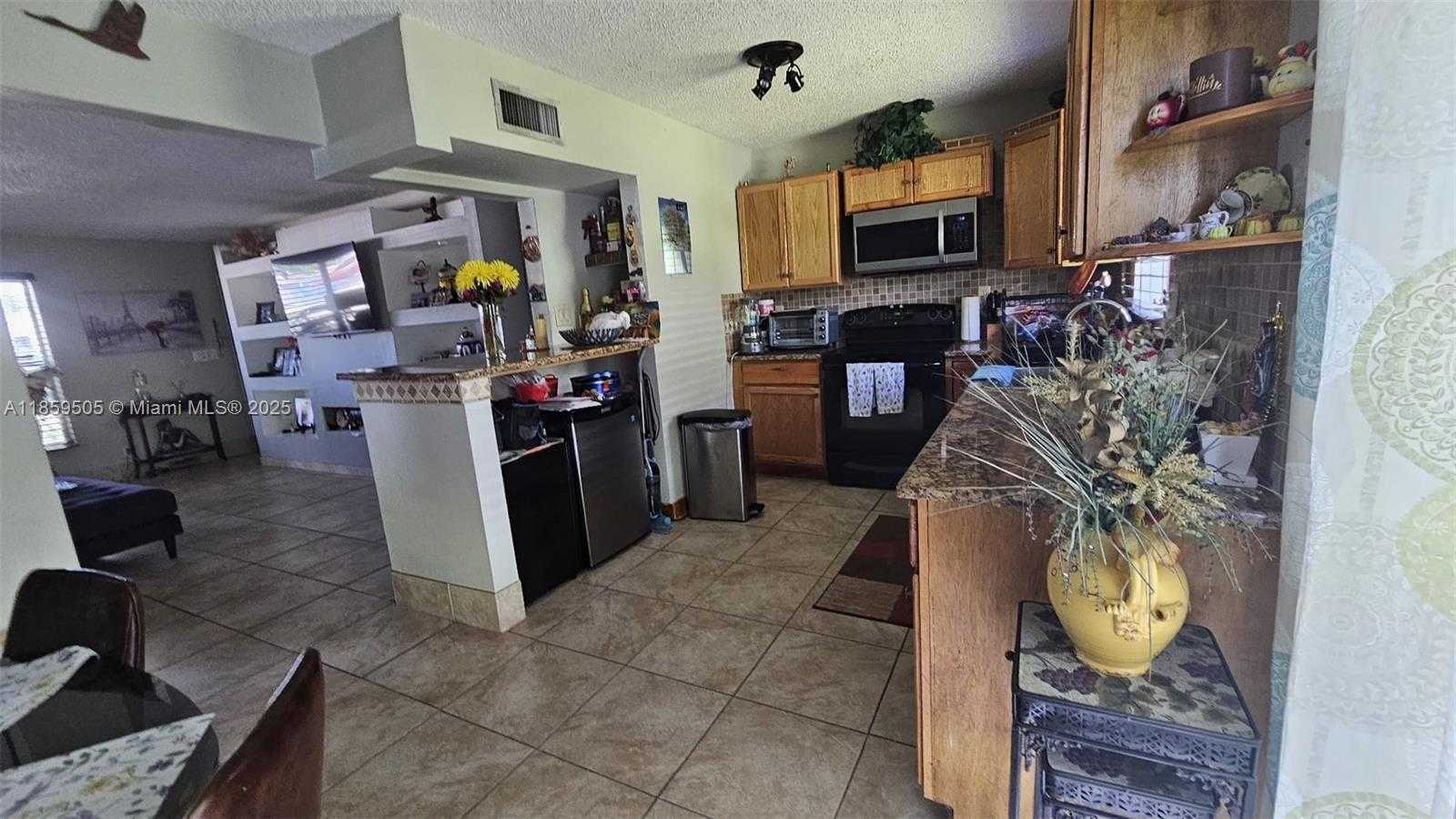 Small Image of 7501 KIMBERLY BLVD #104, North Lauderdale Number 3