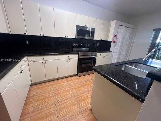 Small Image of 2217 SOUTH EAST 23RD RD #2217, Homestead Number 8