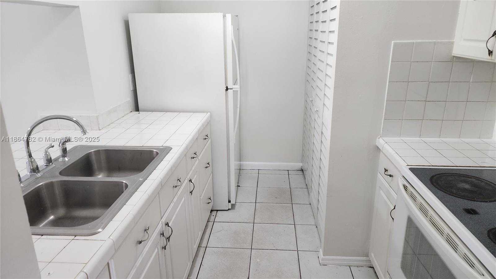 Small Image of 9708 HAMMOCKS BLVD #101-32, Miami Number 3