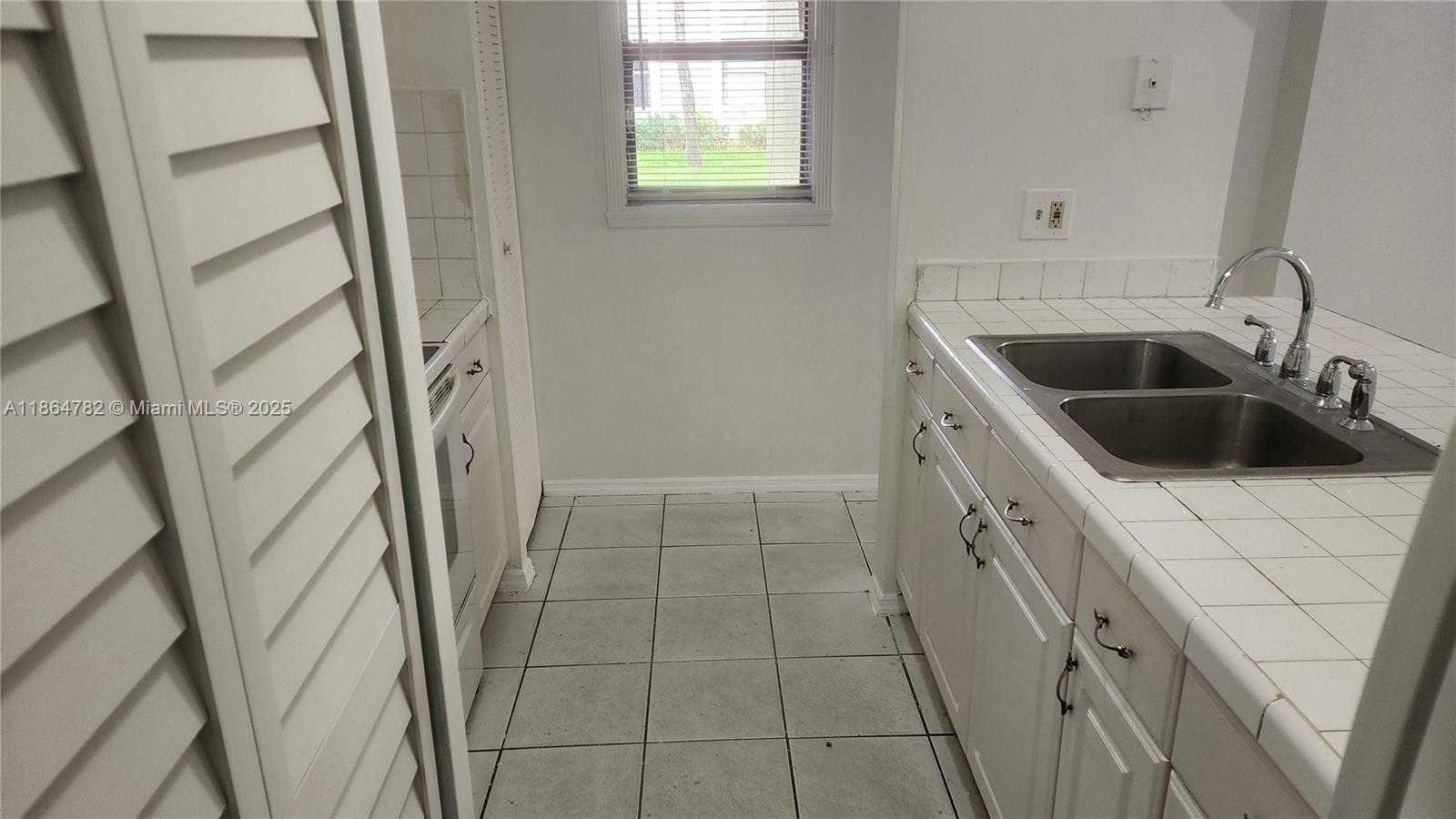 Small Image of 9708 HAMMOCKS BLVD #101-32, Miami Number 4