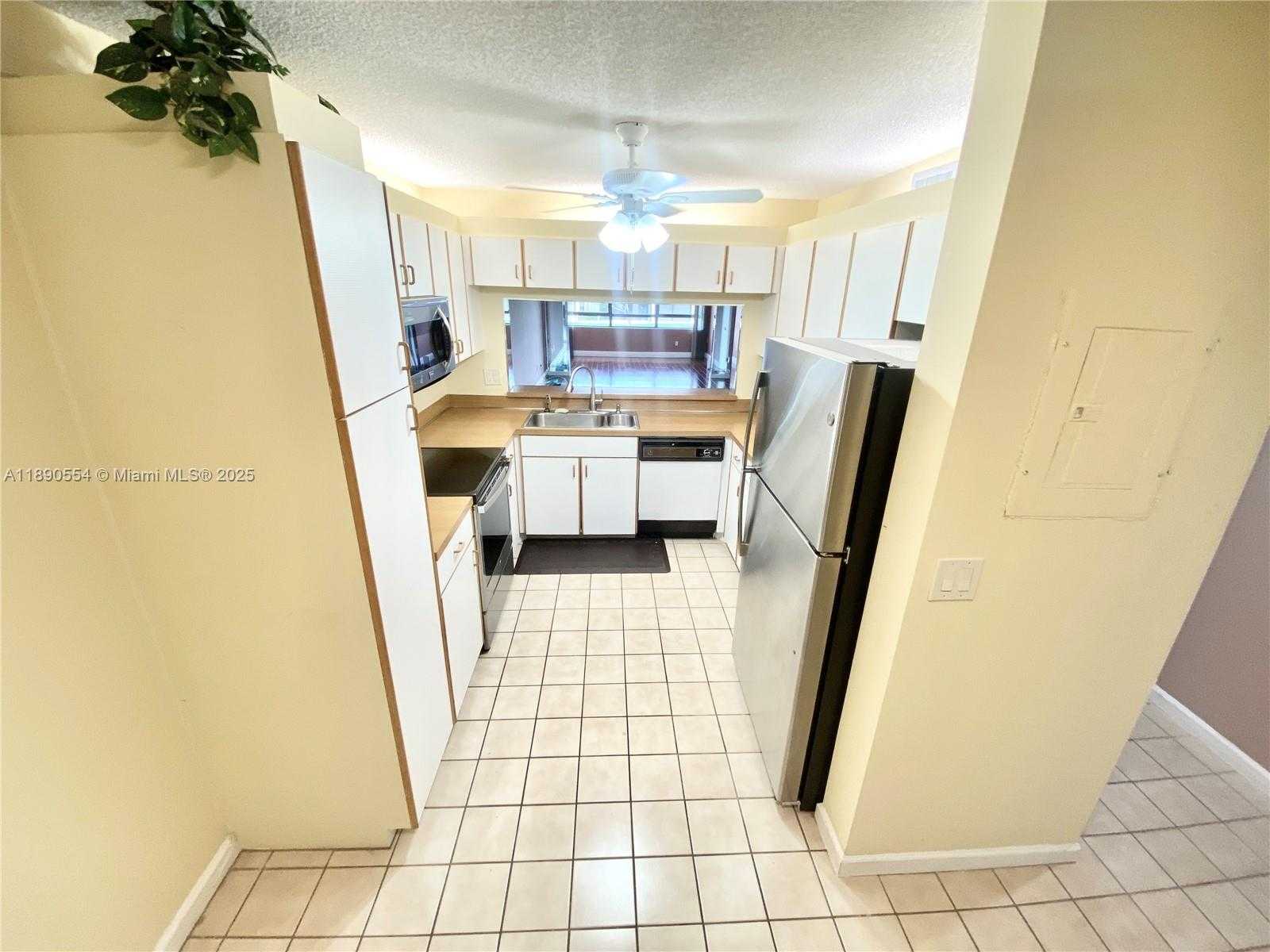 Small Image of 10540 EAST CLAIRMONT CIR #205, Tamarac Number 10