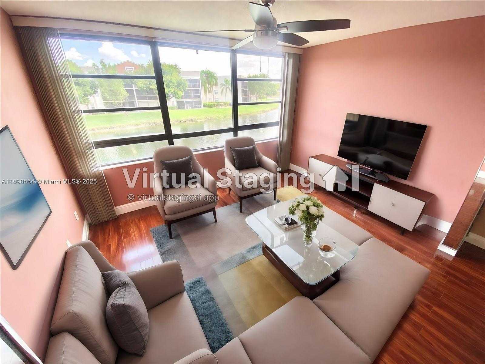 Small Image of 10540 EAST CLAIRMONT CIR #205, Tamarac Number 2