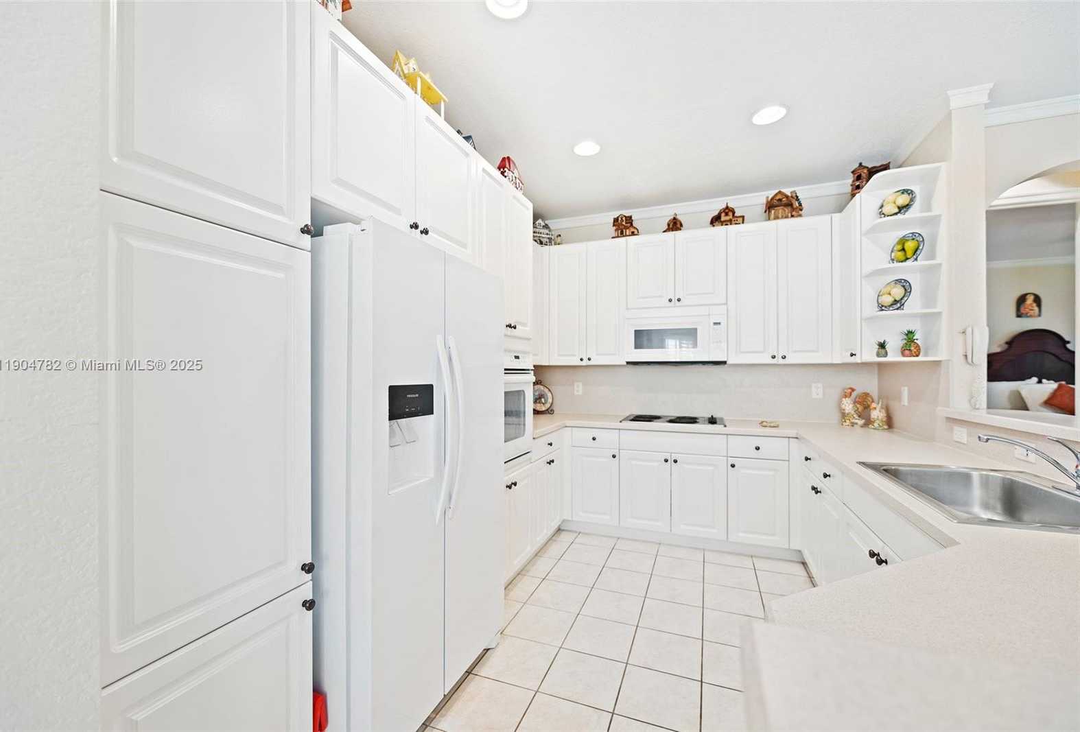 Small Image of 1634 PASSION VINE CIR #31-2, Weston Number 7