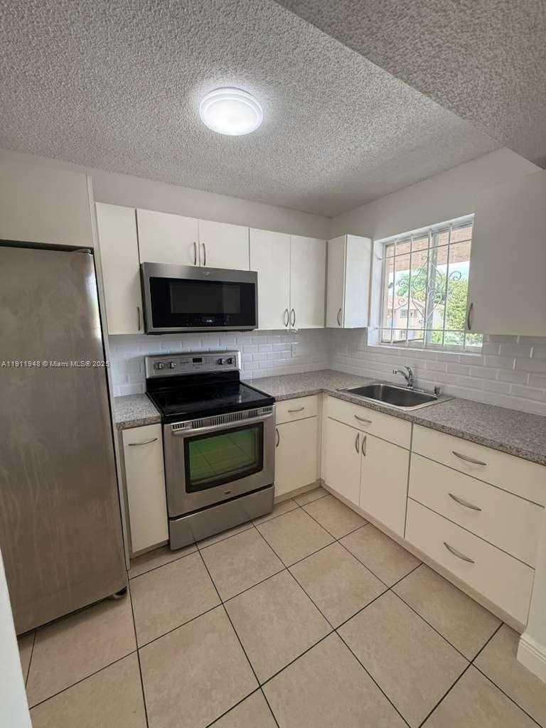 Small Image of 7785 WEST 30 CT #F-202, Hialeah Gardens Number 3