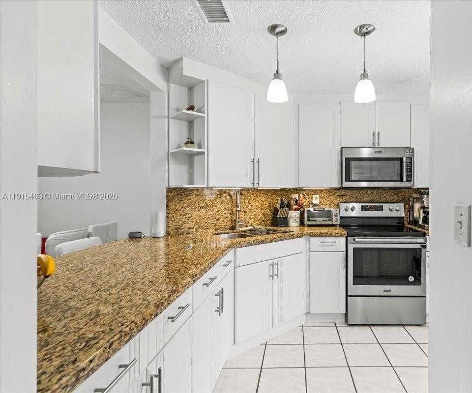 Small Image of 10014 HAMMOCKS BLVD #204-4, Miami Number 2