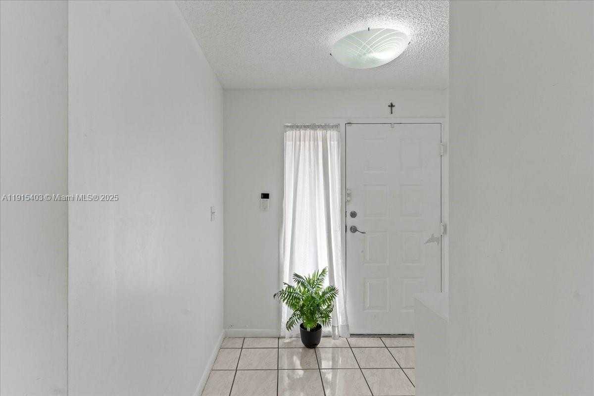 Small Image of 10014 HAMMOCKS BLVD #204-4, Miami Number 34