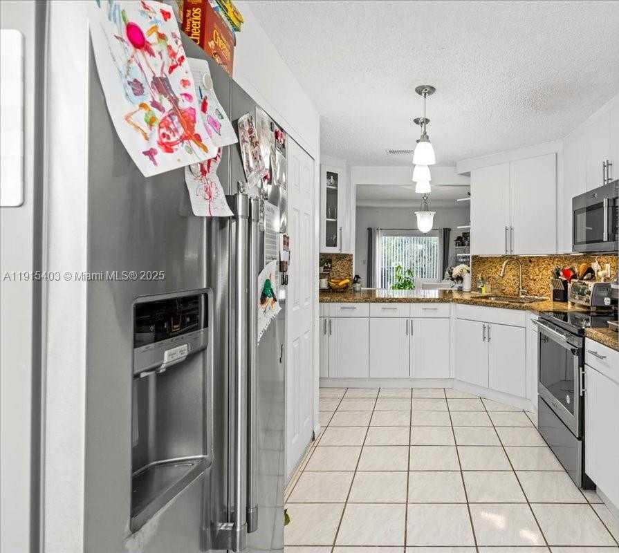 Small Image of 10014 HAMMOCKS BLVD #204-4, Miami Number 4