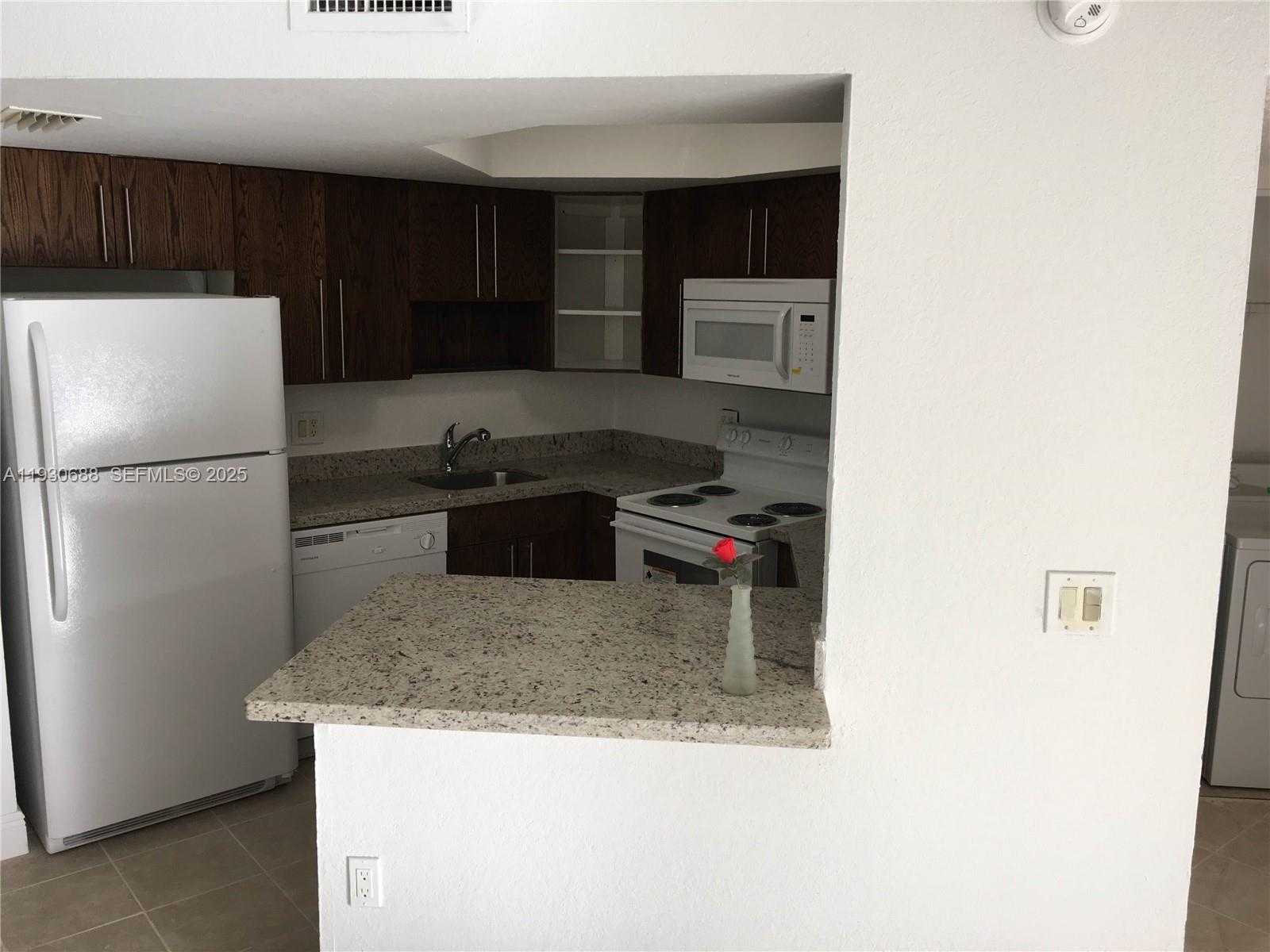 Small Image of 8255 LAKE DR #206, Doral Number 3