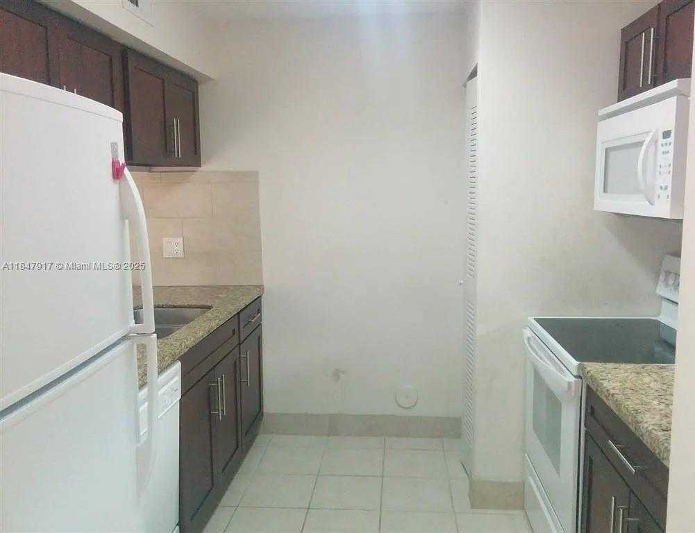 Small Image of 8734 SOUTH WEST 3RD ST #3, Pembroke Pines Number 2