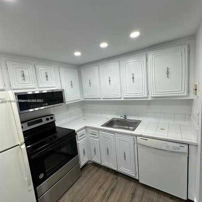 Small Image of 492 NORTH WEST 165TH ST RD #C-415, Miami Number 7