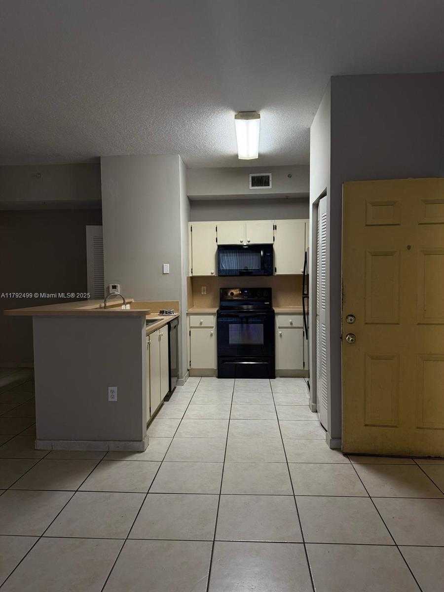 Small Image of 7330 NORTH WEST 114 AV #112, Doral Number 2