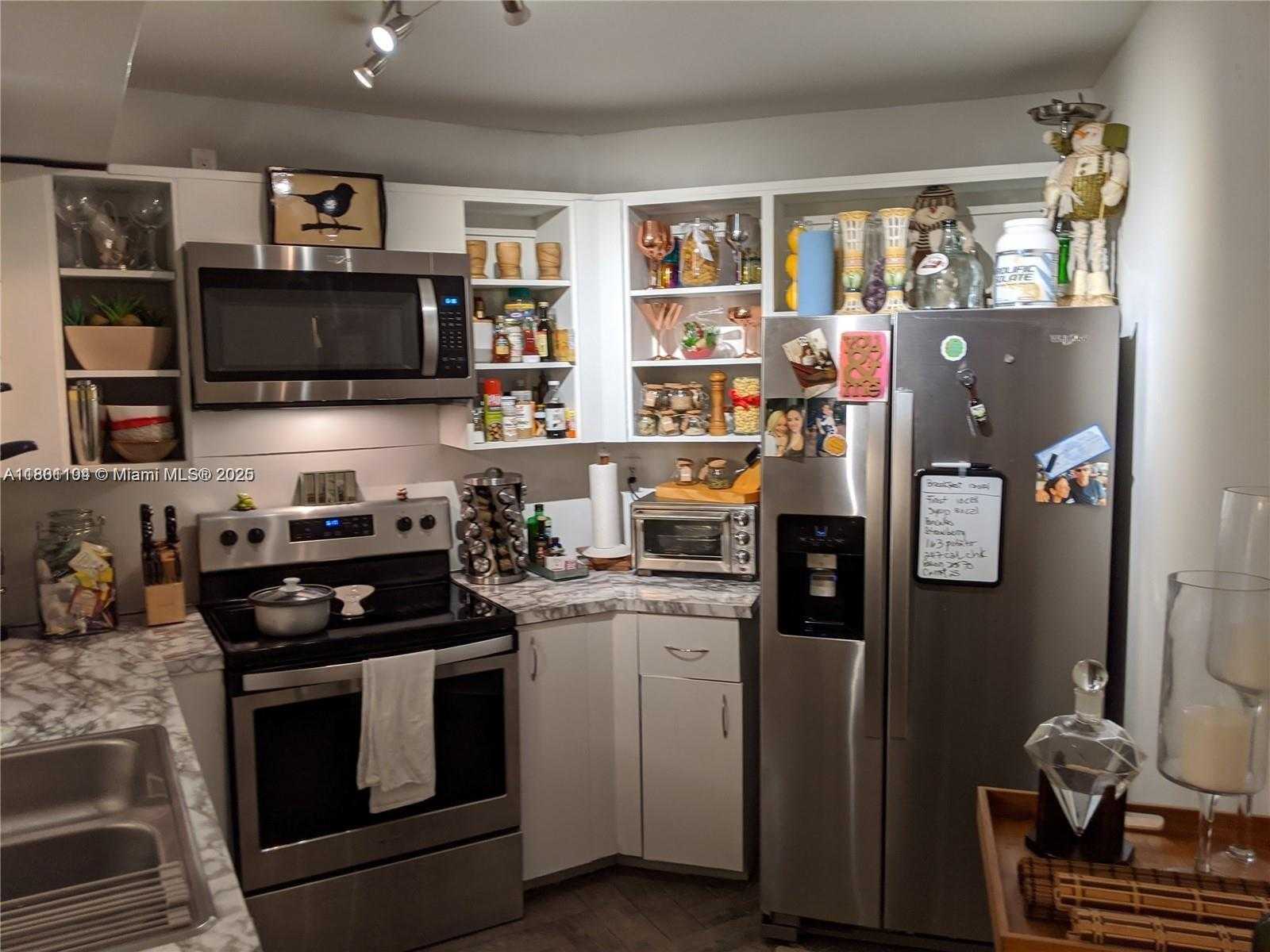 Small Image of 9731 NORTH FONTAINEBLEAU BLVD #F110, Miami Number 2