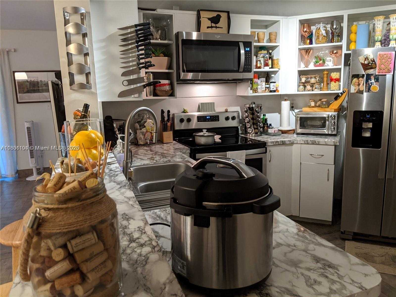 Small Image of 9731 NORTH FONTAINEBLEAU BLVD #F110, Miami Number 3