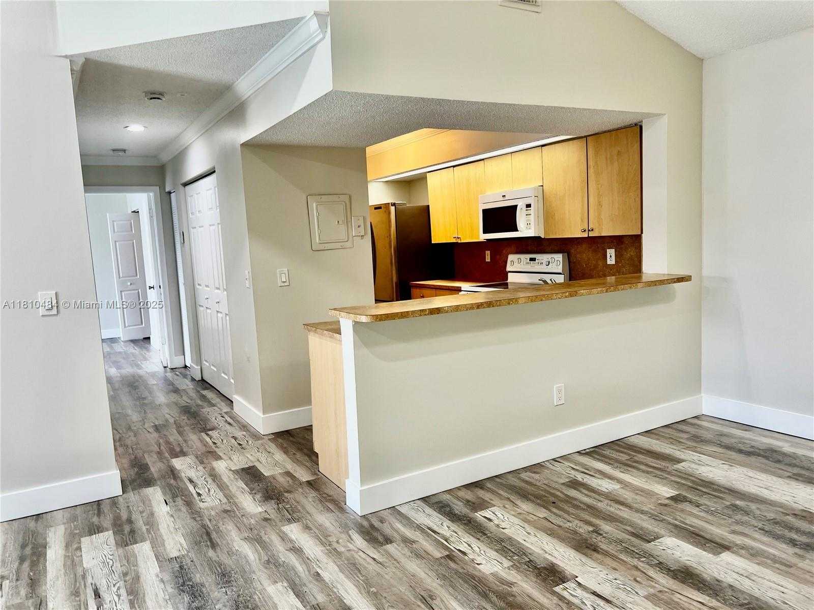 Small Image of 18850 NORTH WEST 57TH AVE #305, Hialeah Number 2