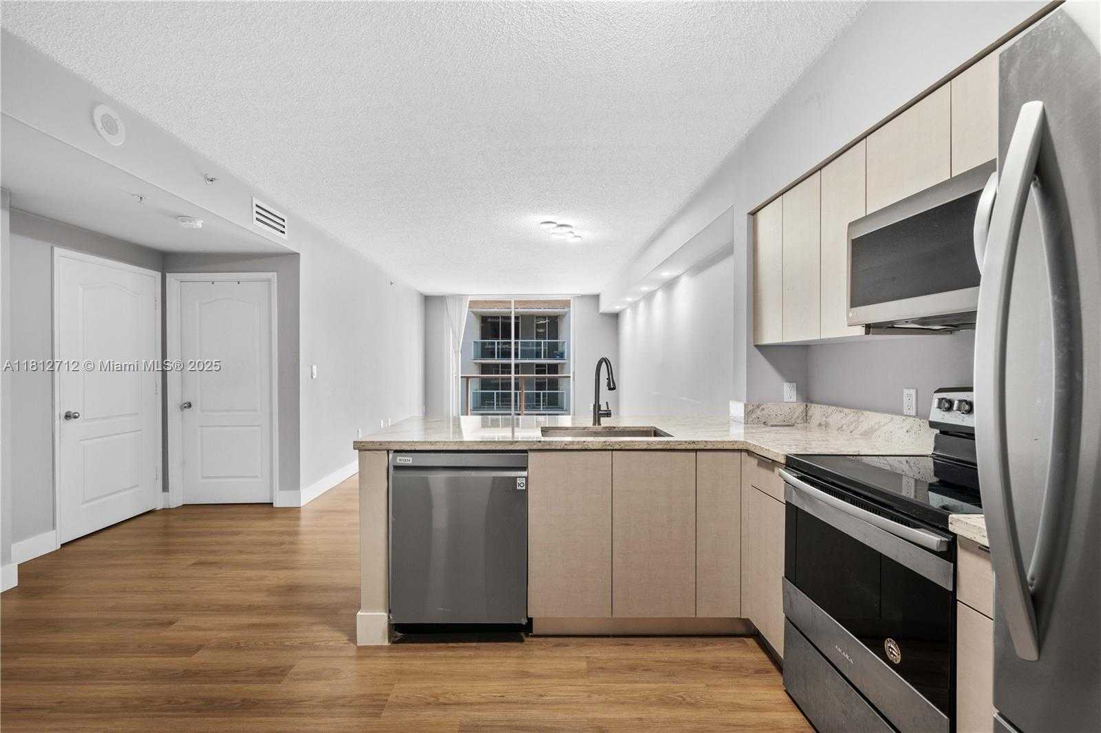 Small Image of 5091 NORTH WEST 7TH ST #907, Miami Number 2