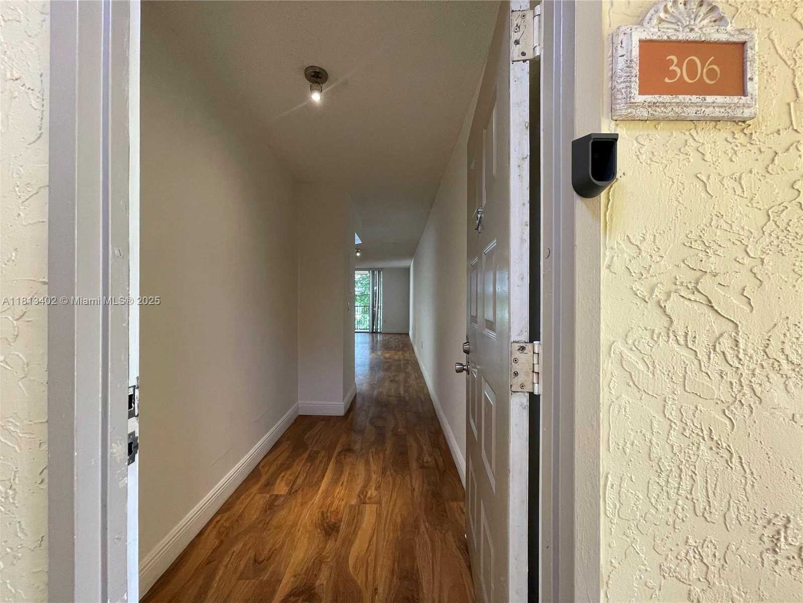 Small Image of 8373 LAKE DR #306, Doral Number 2
