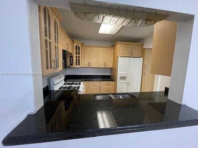 Small Image of 18051 NORTH WEST 68TH AVE #K209, Hialeah Number 2