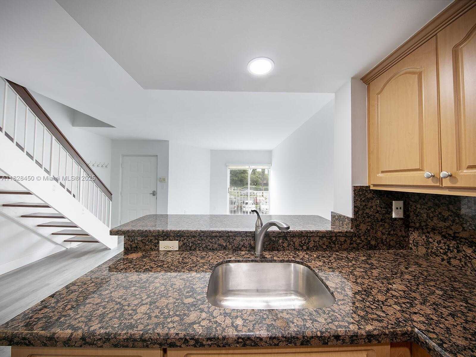 Small Image of 670 NW 85th Pl, Miami, FL 33126, USA Number 3