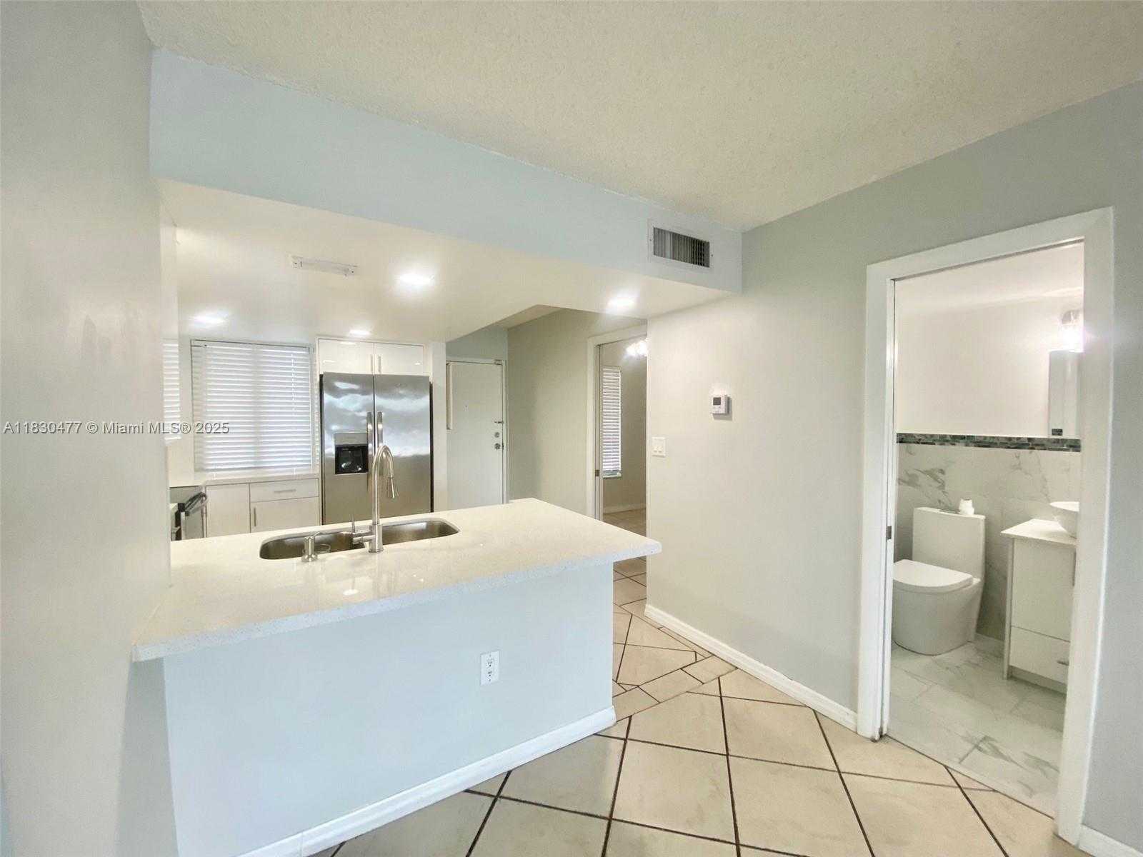 Small Image of 9911 WEST OKEECHOBEE RD #1-402, Hialeah Gardens Number 5