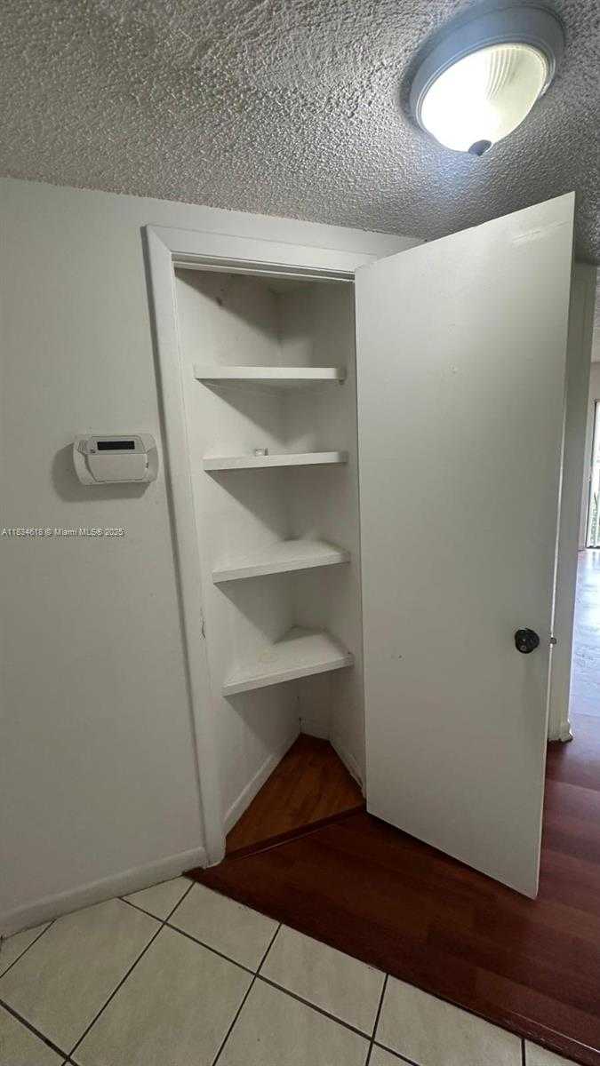 Small Image of 8290 LAKE DR #124, Doral Number 2