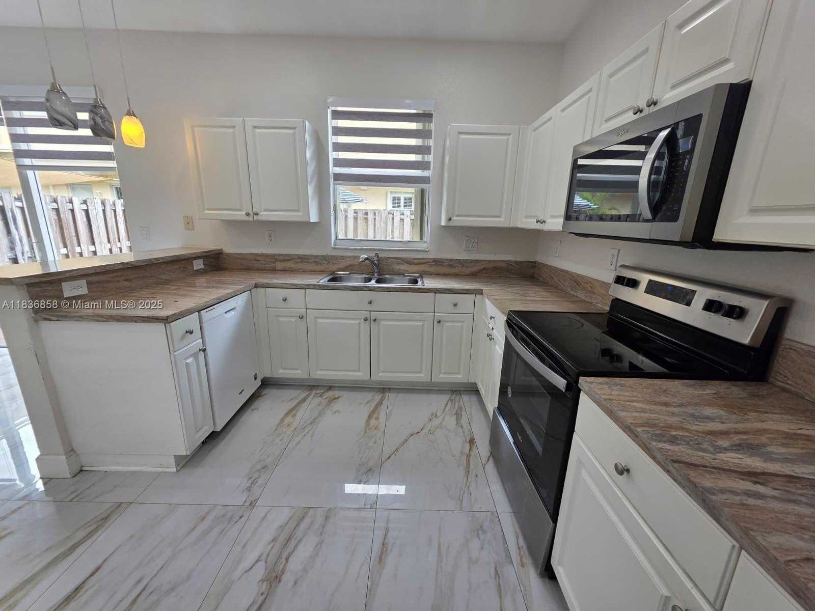 Small Image of 12822 SOUTH WEST 135TH ST #12822, Miami Number 2
