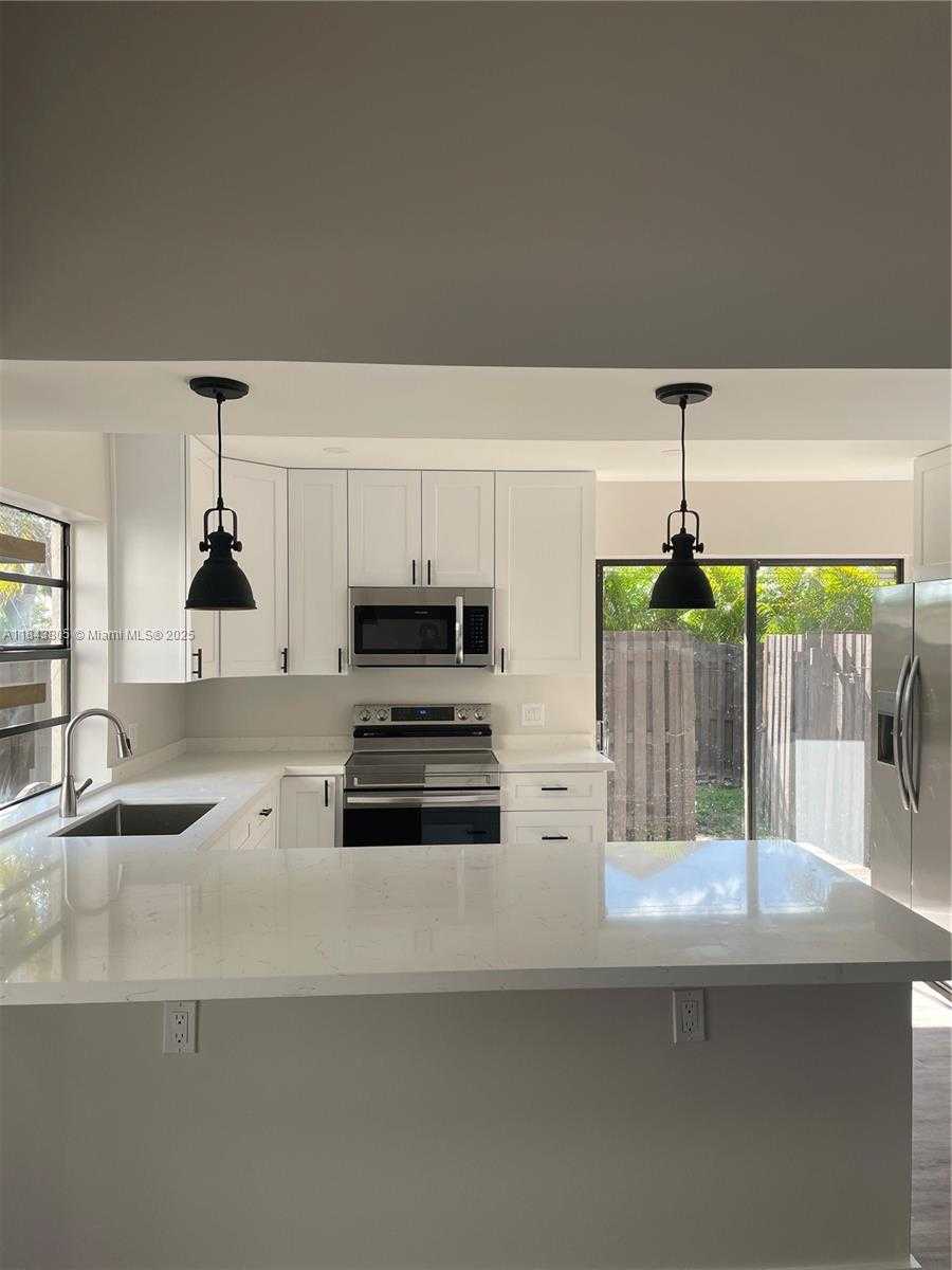Small Image of 11439 SOUTH WEST 132ND PL #73-3, Miami Number 5