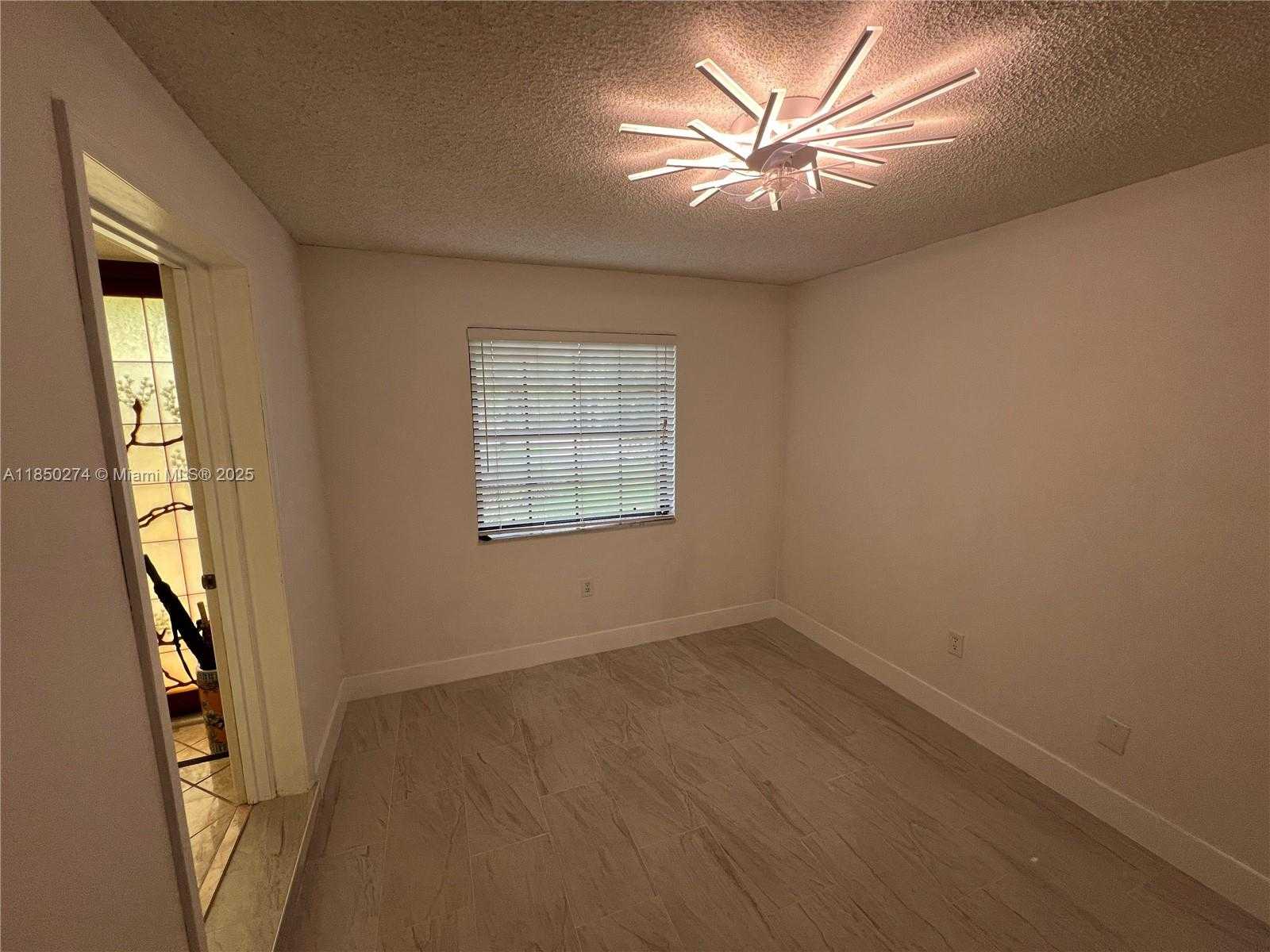 Small Image of 9501 EAST CALUSA CLUB DR, Miami Number 9
