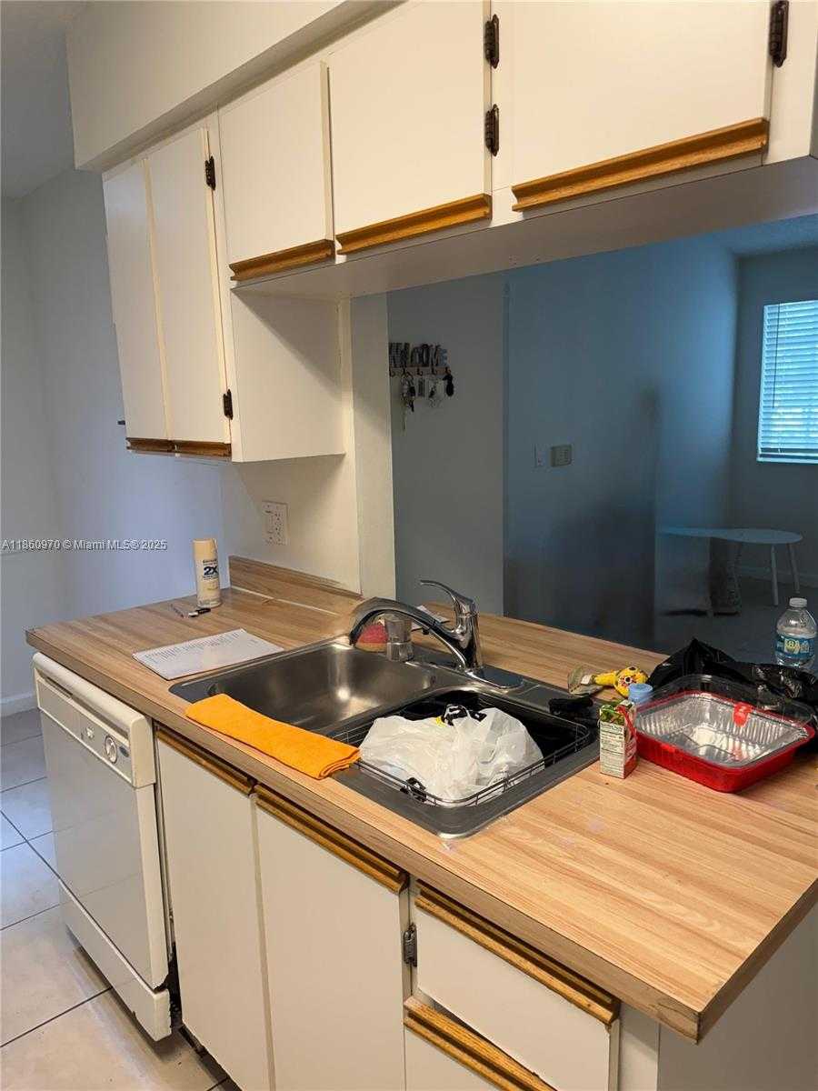 Small Image of 18348 NORTH WEST 68TH AVE #G, Hialeah Number 2