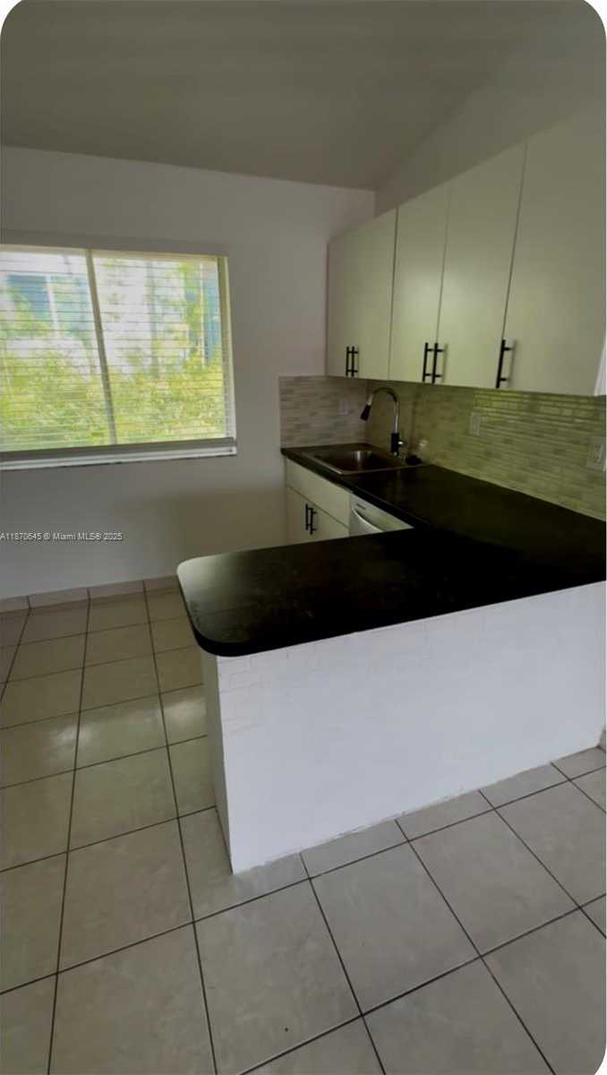 Small Image of 8023 LAKE DR #204, Doral Number 2